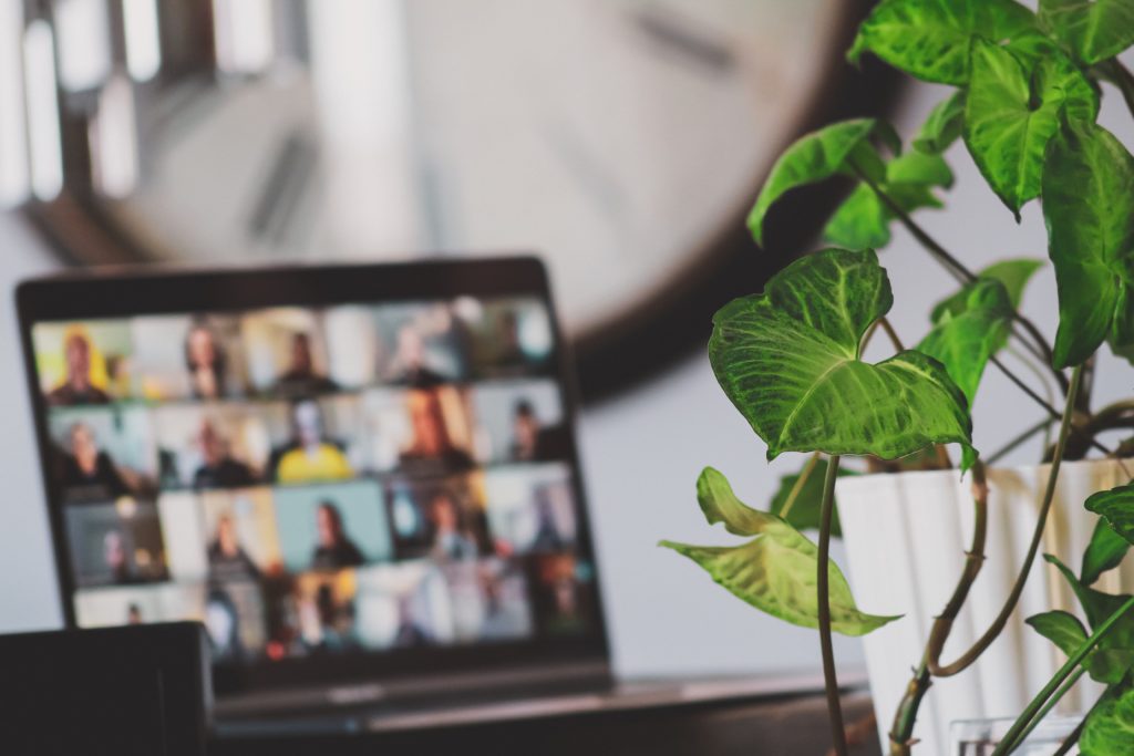 Image of laptop with several people on a video call