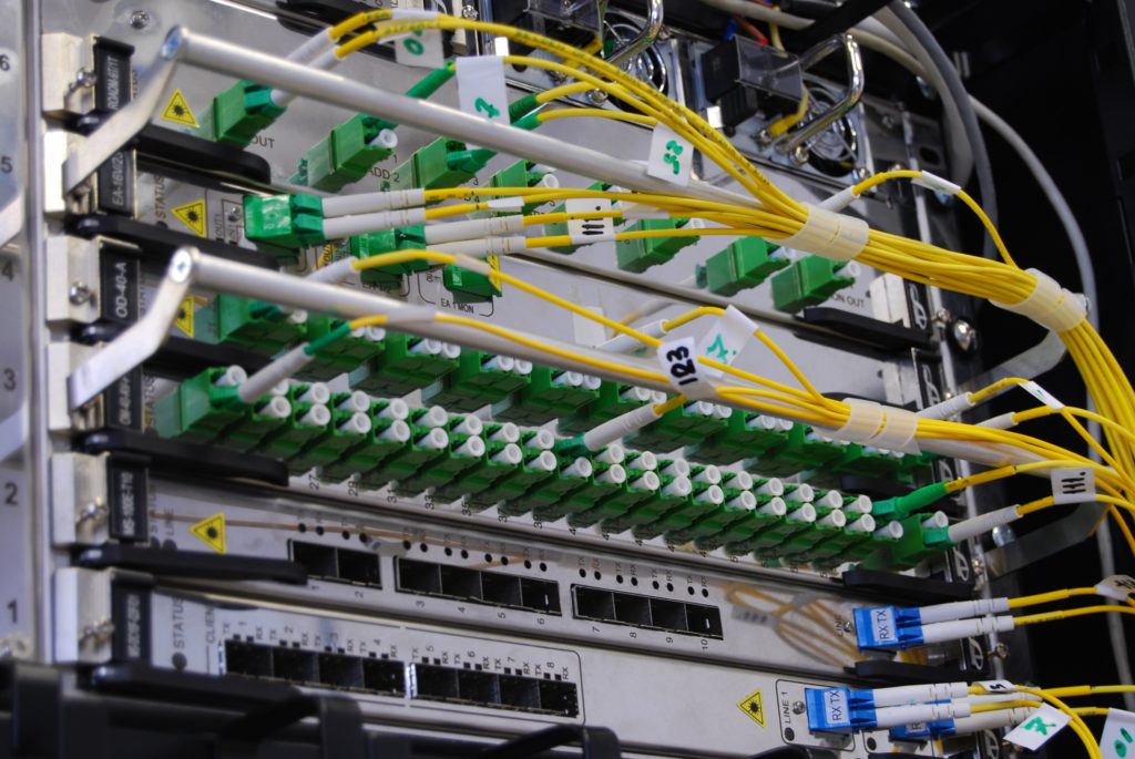 Image shows yellow fibre optic cables. 