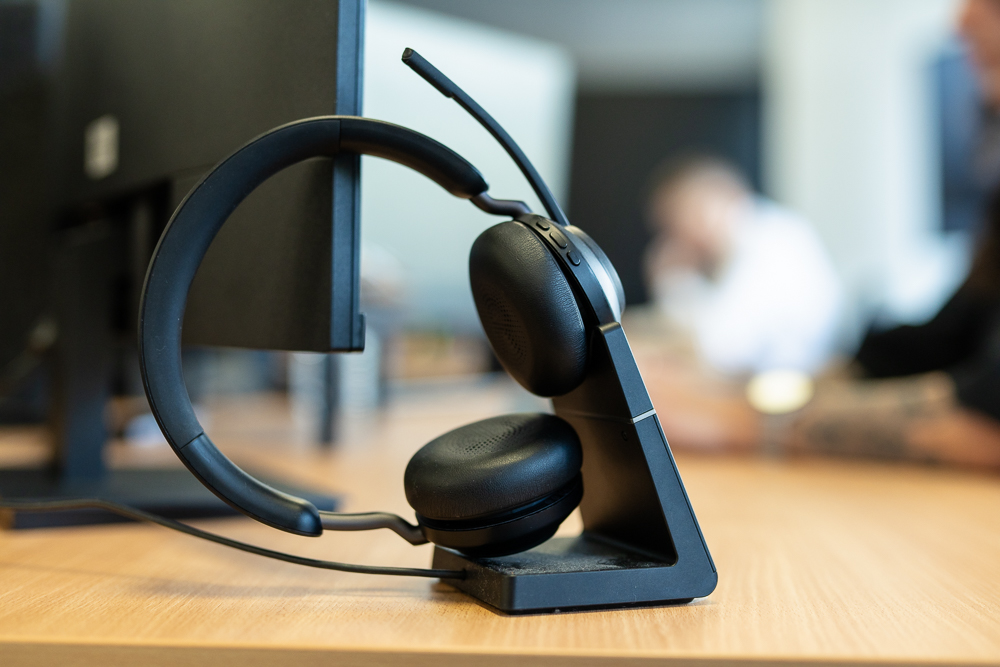 Business Headset on a stand in a telecom office.